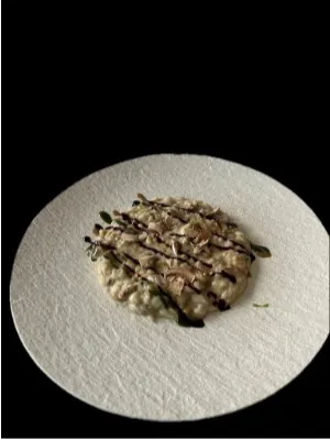 Risotto ai sapori d’inverno con funghi, tartufo e riduzione